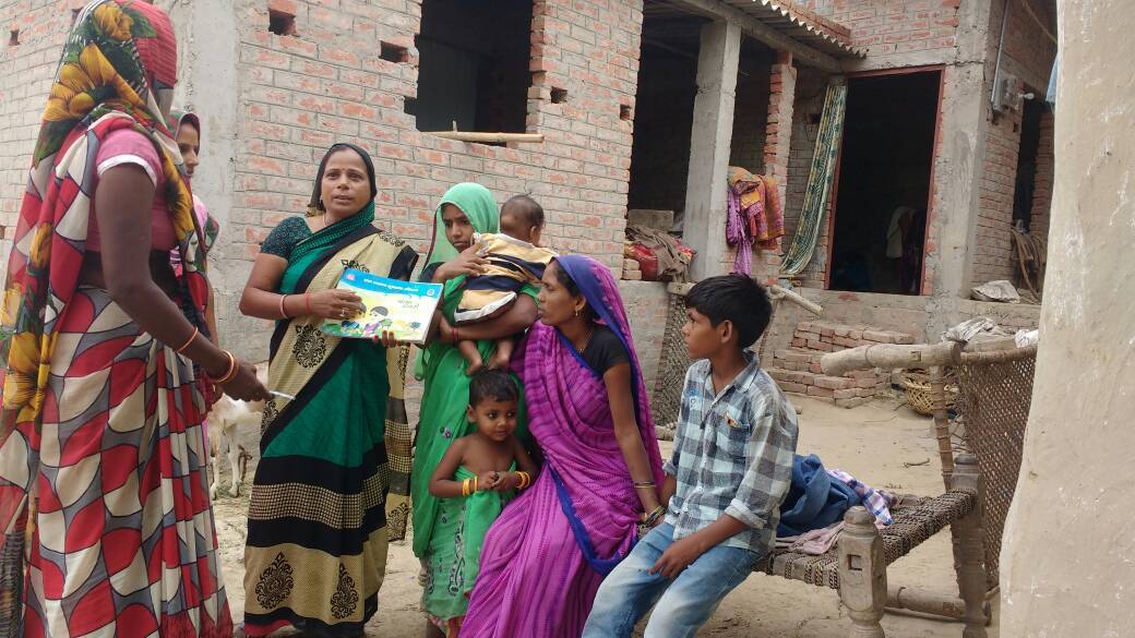 An ASHA speaks with village women in Varanasi, Uttar Pradesh. (Photo credit: Ishita Mishra). An ASHA speaks with village women in Varanasi, Uttar Pradesh. (Photo credit: Ishita Mishra).