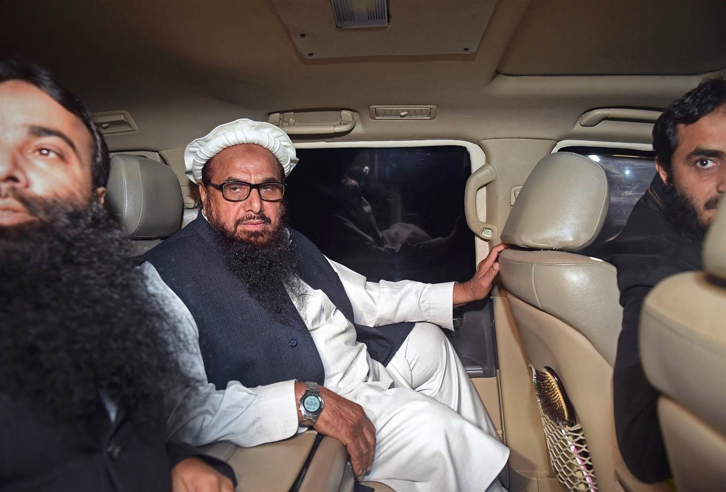 Hafiz Saeed, the Pakistani leader of Jamaat-ud-Dawa, leaves in a car after being detained by police in Lahore, early on Jan. 31, 2017. Image: AFP Hafiz Saeed, the Pakistani leader of Jamaat-ud-Dawa, leaves in a car after being detained by police in Lahore, early on Jan. 31, 2017. Image: AFP